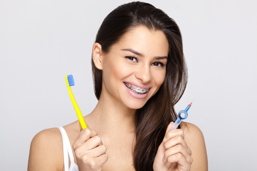 how to care for the teeth behind the braces